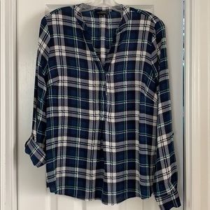 The limited blue plaid long sleeved blouse
